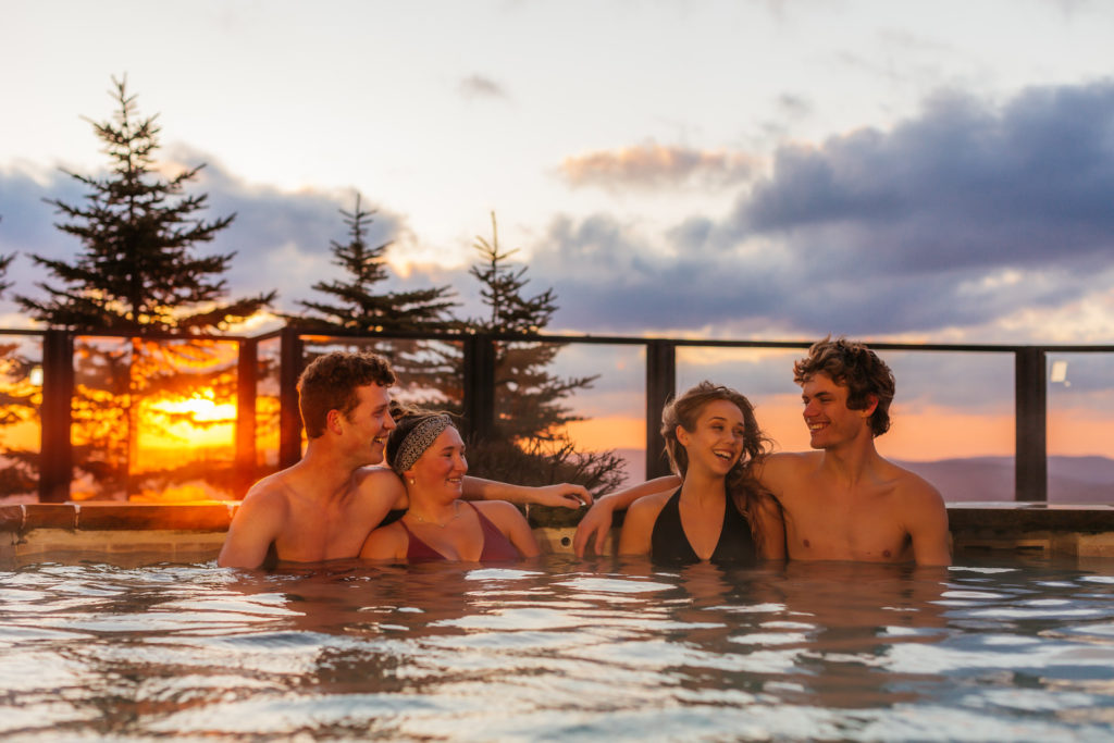 Couples in Hot tub at sunset